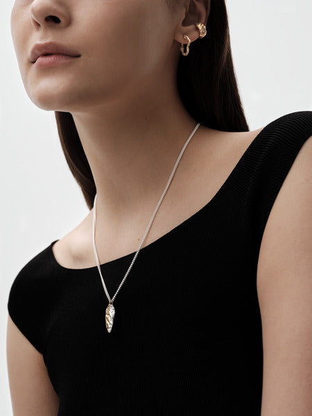 Itu pendant seed silver gold-plated