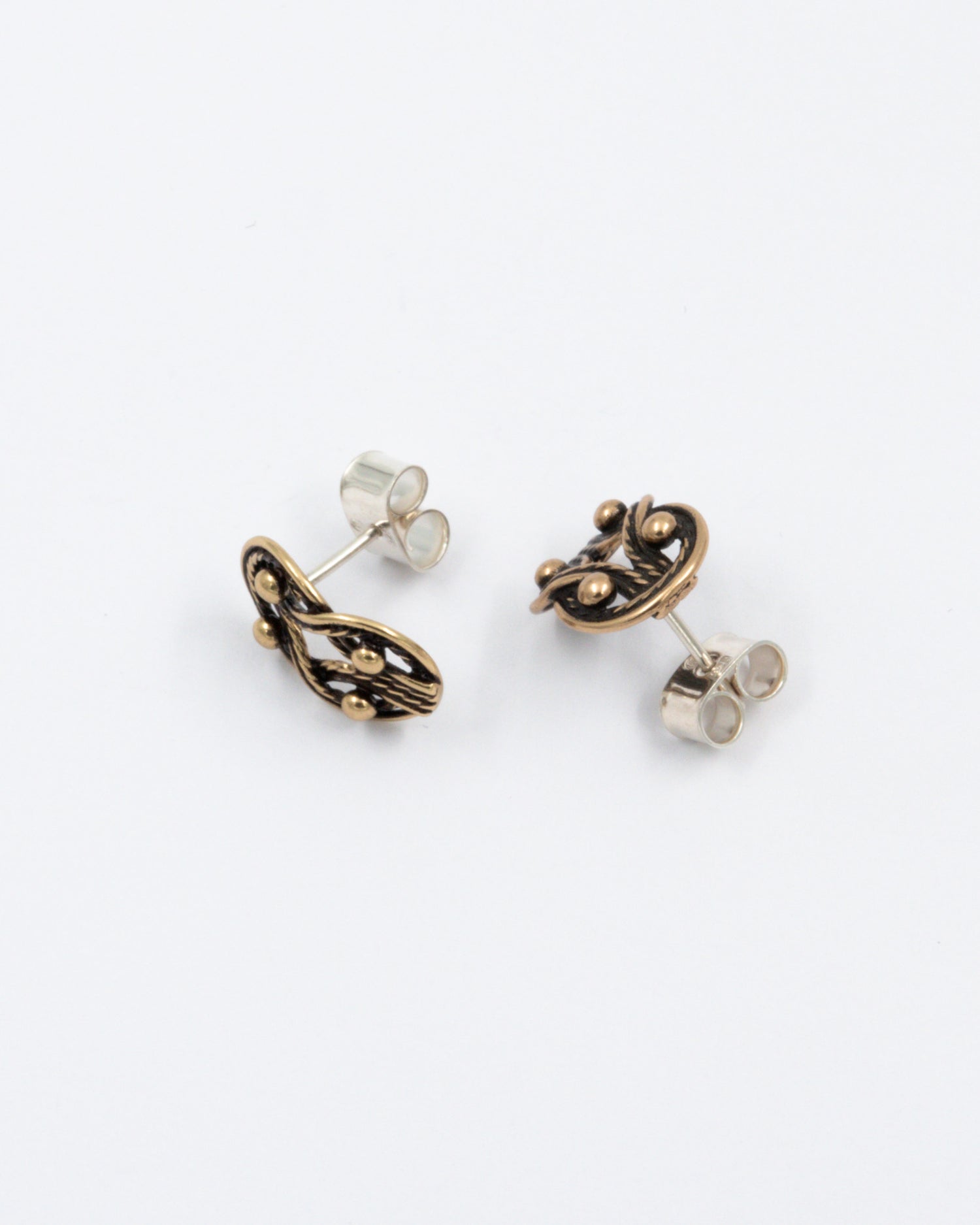 Pidetty Teljänneito-tappikorvakorut pronssi