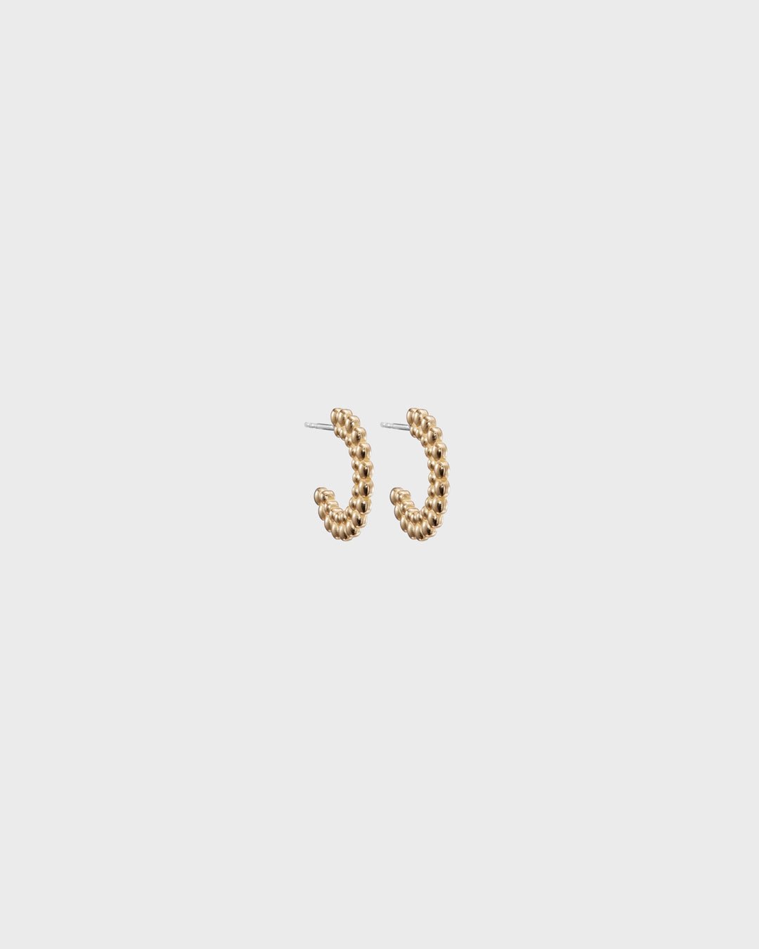 Valoisa hoop earrings bronze half pair left