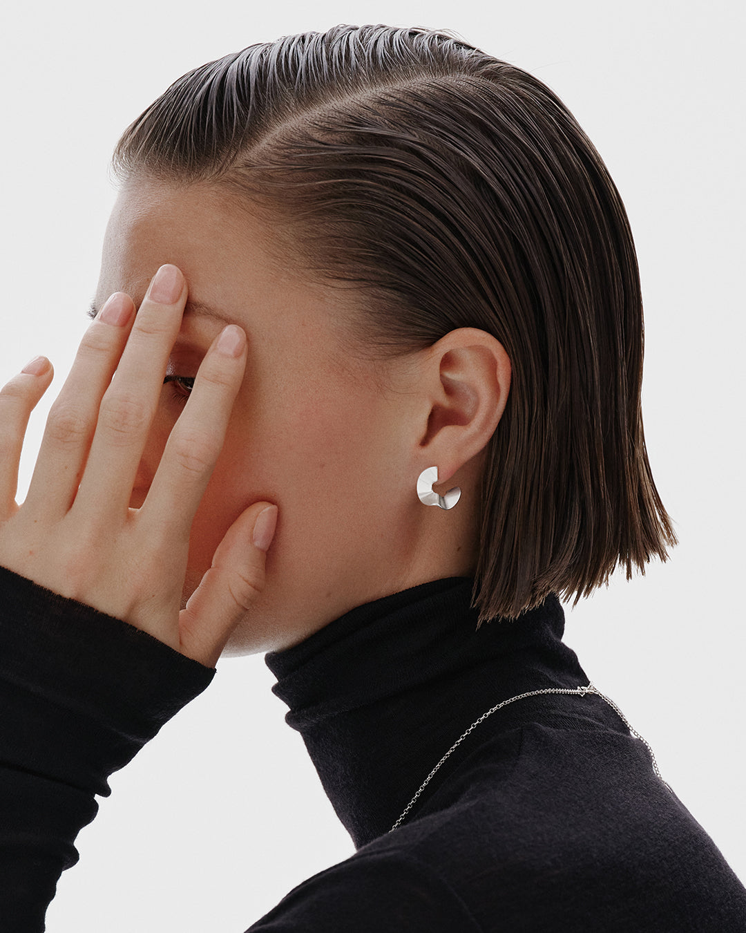 Vetovoima-korvakorut pieni hopea