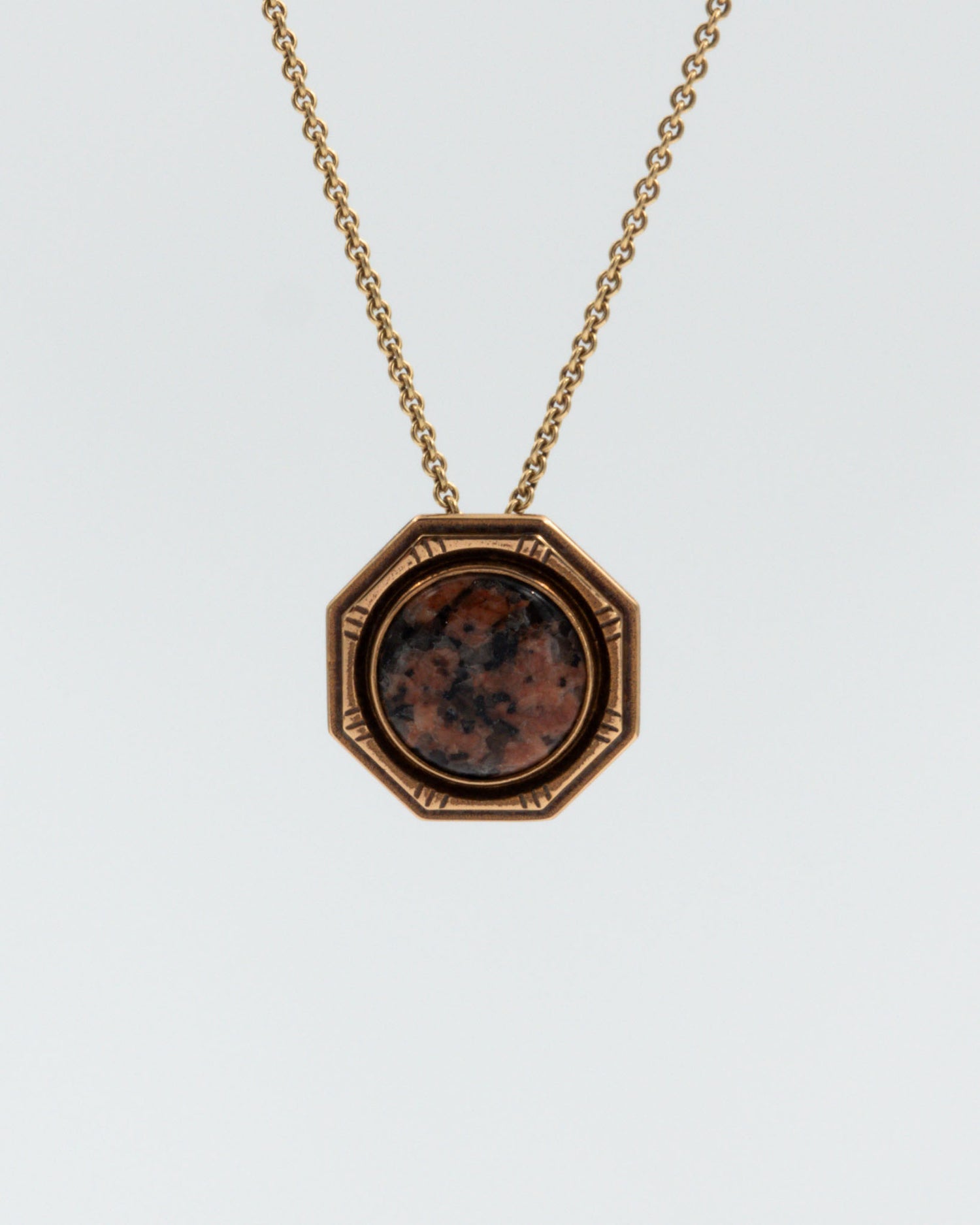 Kept Viapori 250 years buckle pendant bronze red granite
