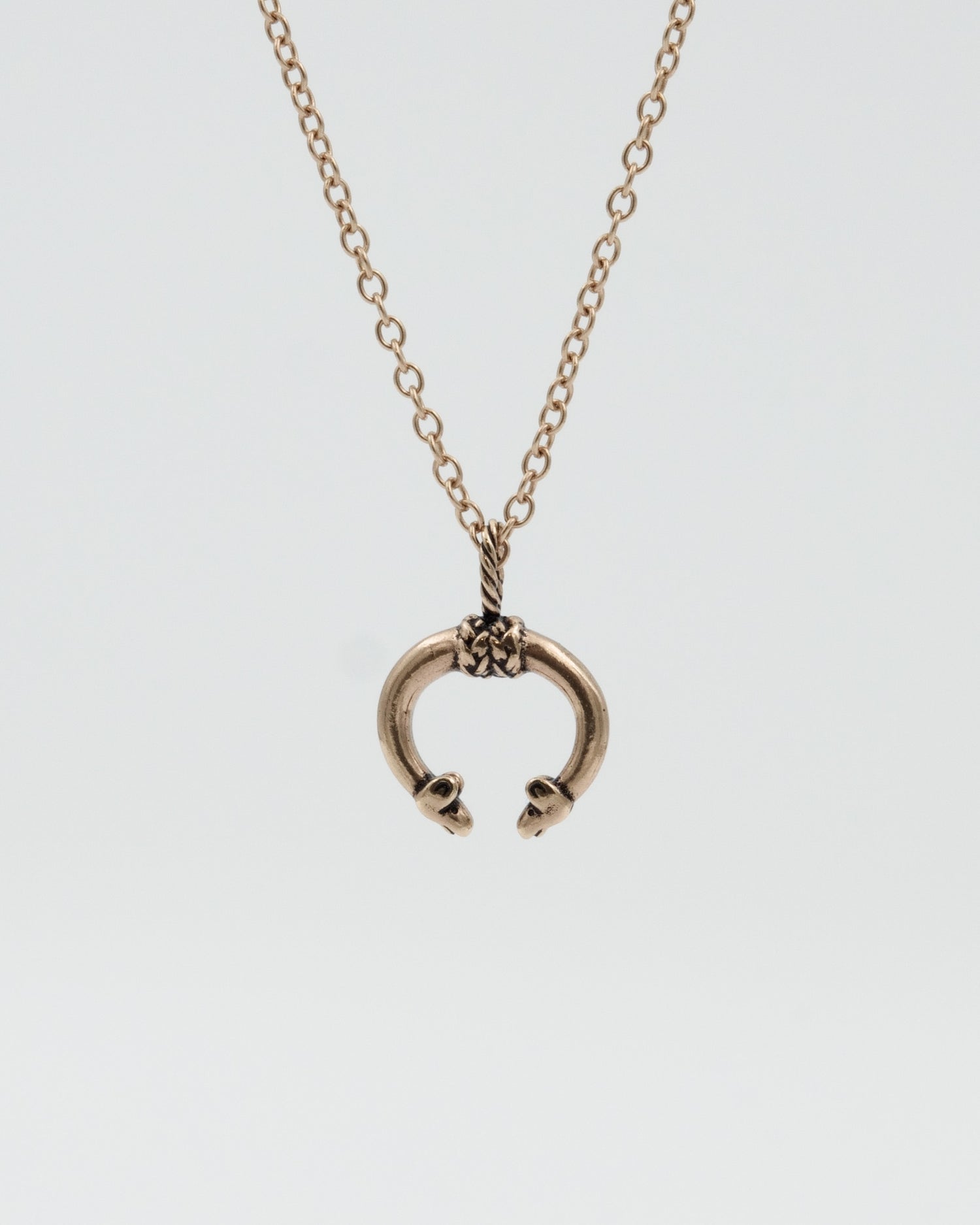 Held Hirvenpää pendant bronze