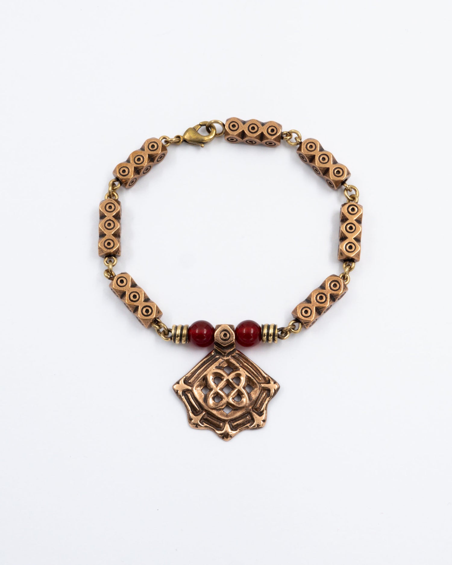 Pidetty Kanteletar-rannekoru pronssi karneoli 20,5 cm