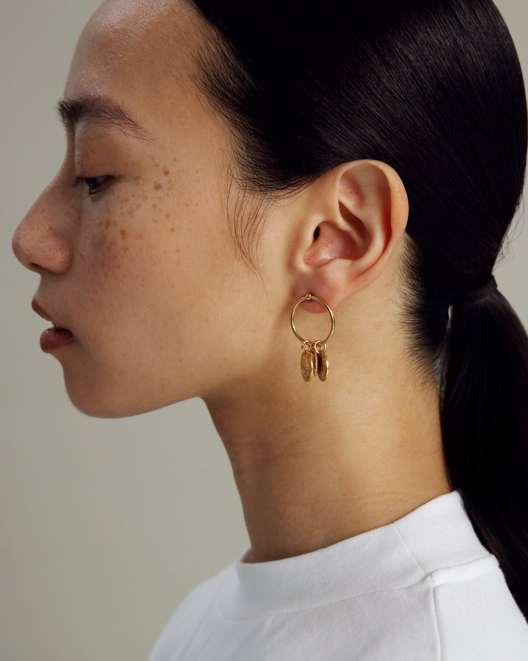 Amulet Hoop Earrings bronze