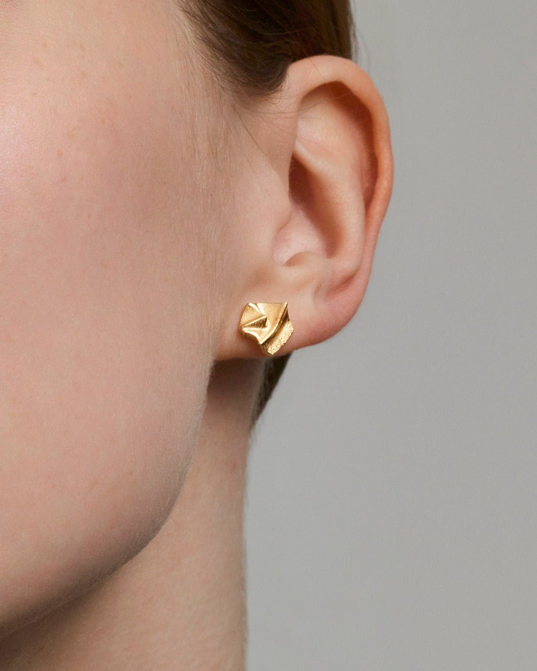 Paio earrings gold half pair left